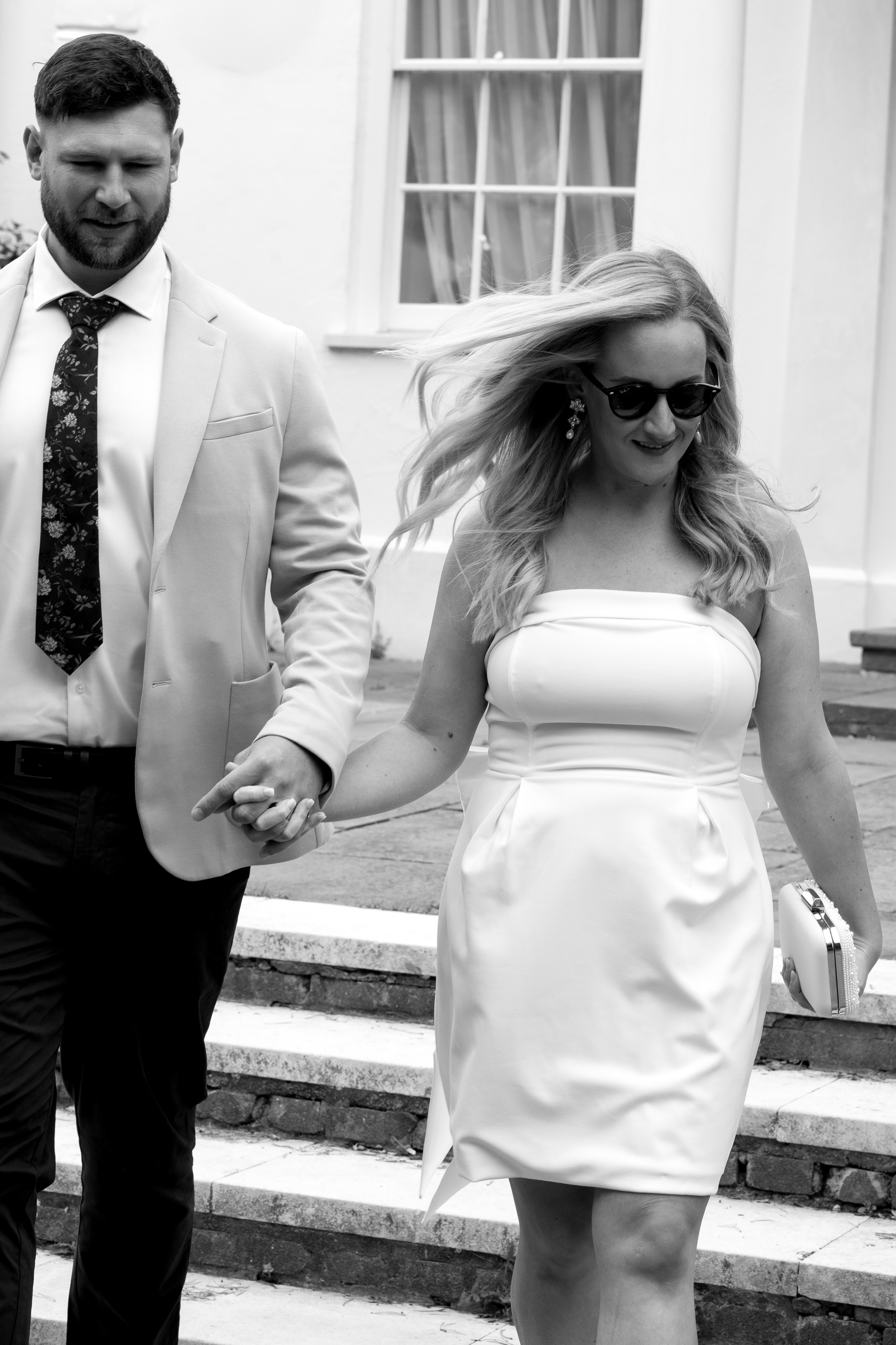 Couple outside Bellair House, Exeter Registry Office