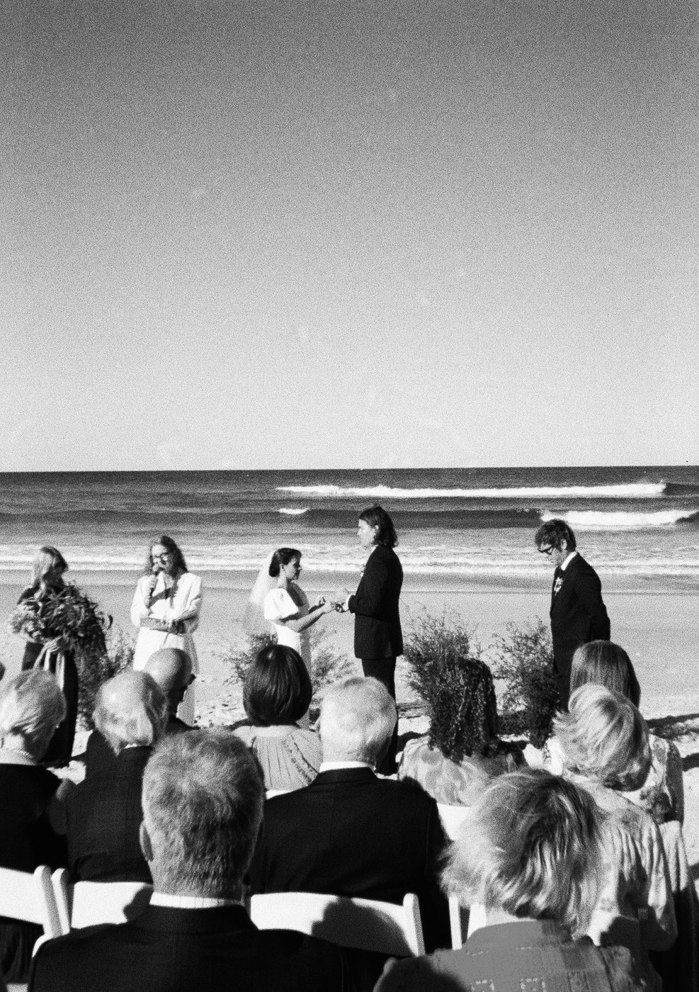 Film photography — black and white beach wedding